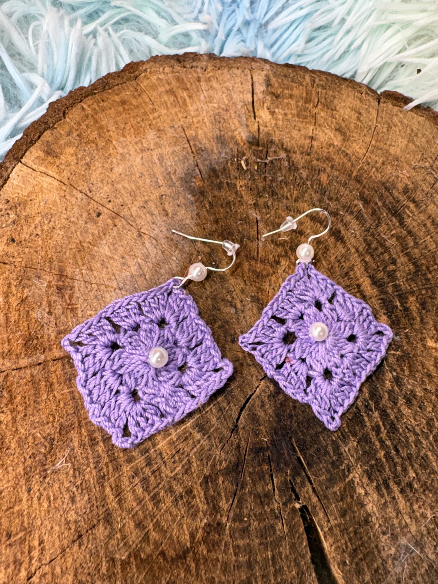 Pendiente cuadrado en violeta